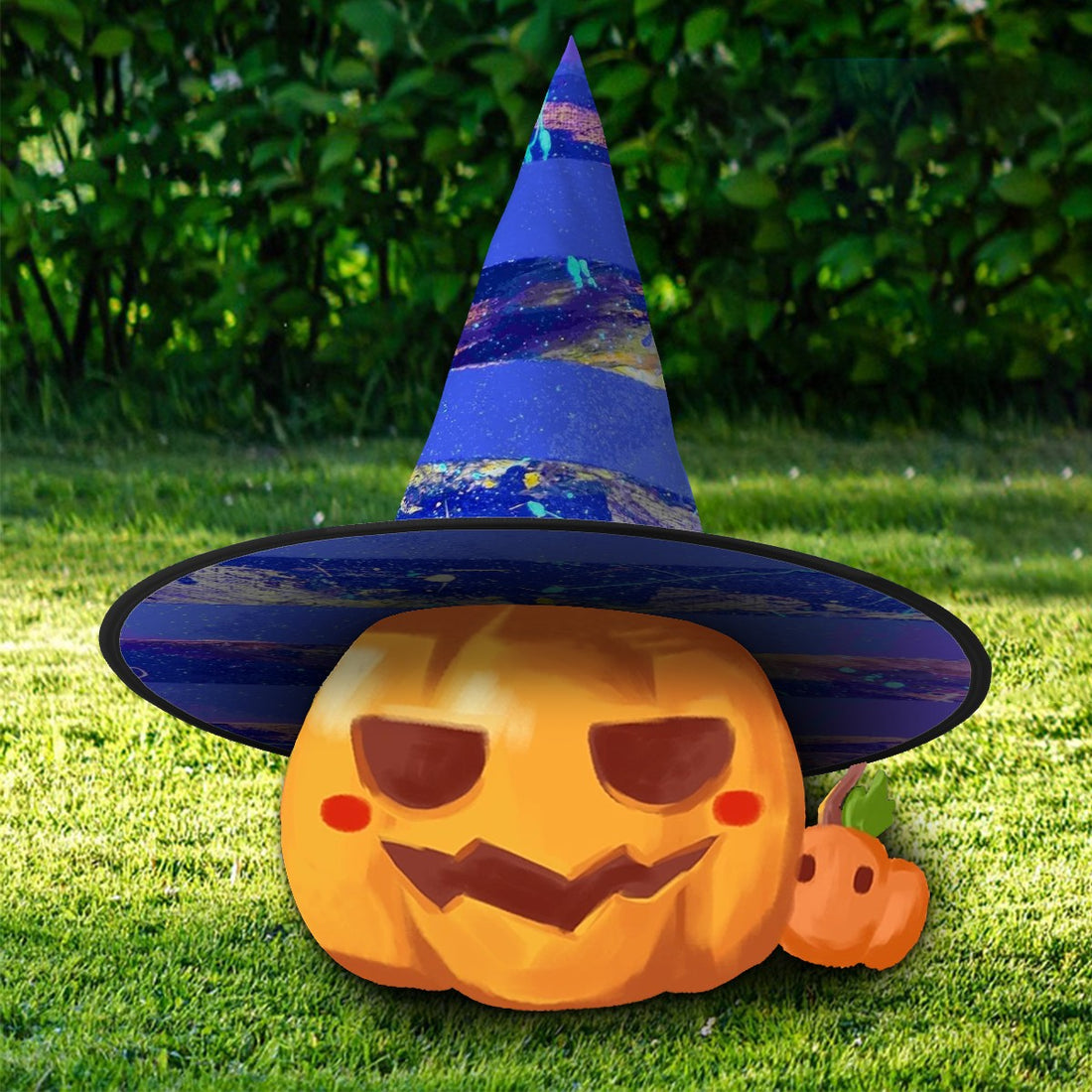 Carved Halloween pumpkin with a mischievous face wearing a tall blue witch hat on grass
